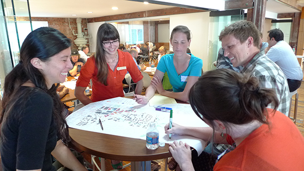 people discussing around a table