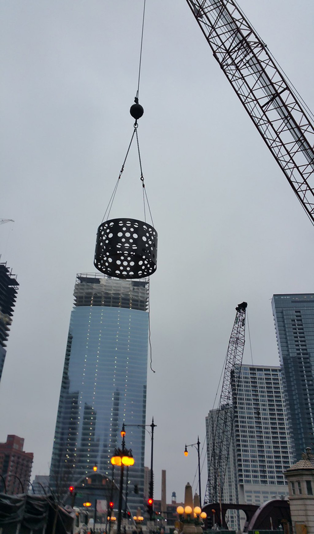 a structure being lifted by a crane