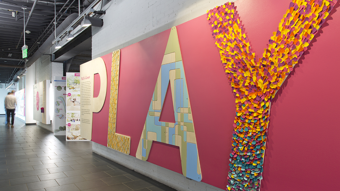 Exhibit wall that reads