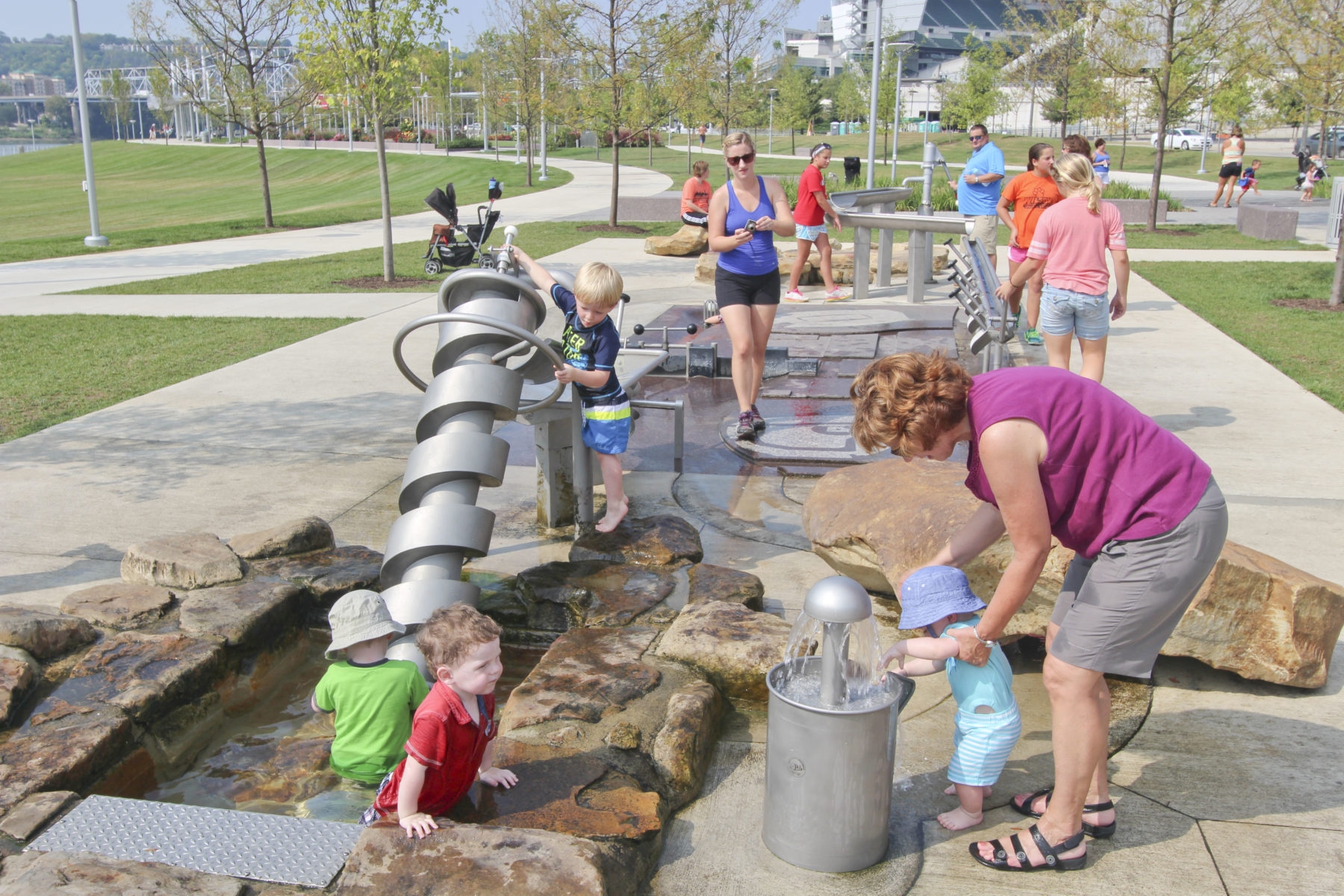 kids playing with water play structures