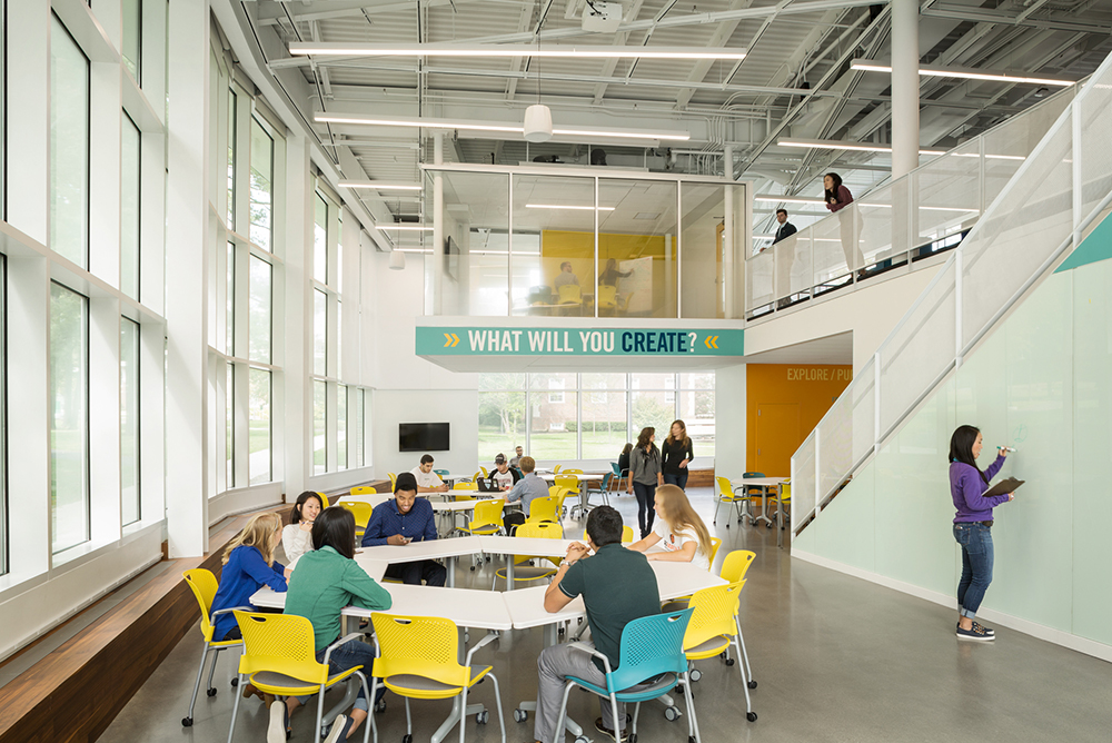 students sitting around a table in innovation center