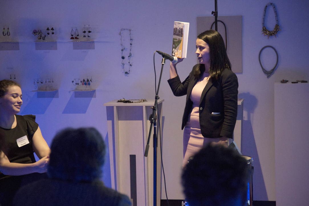 person talking in front of audience