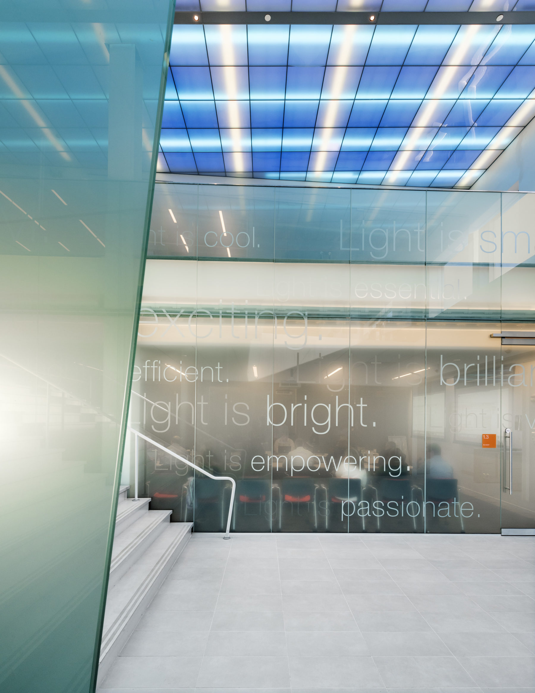 office stairway with word on wall