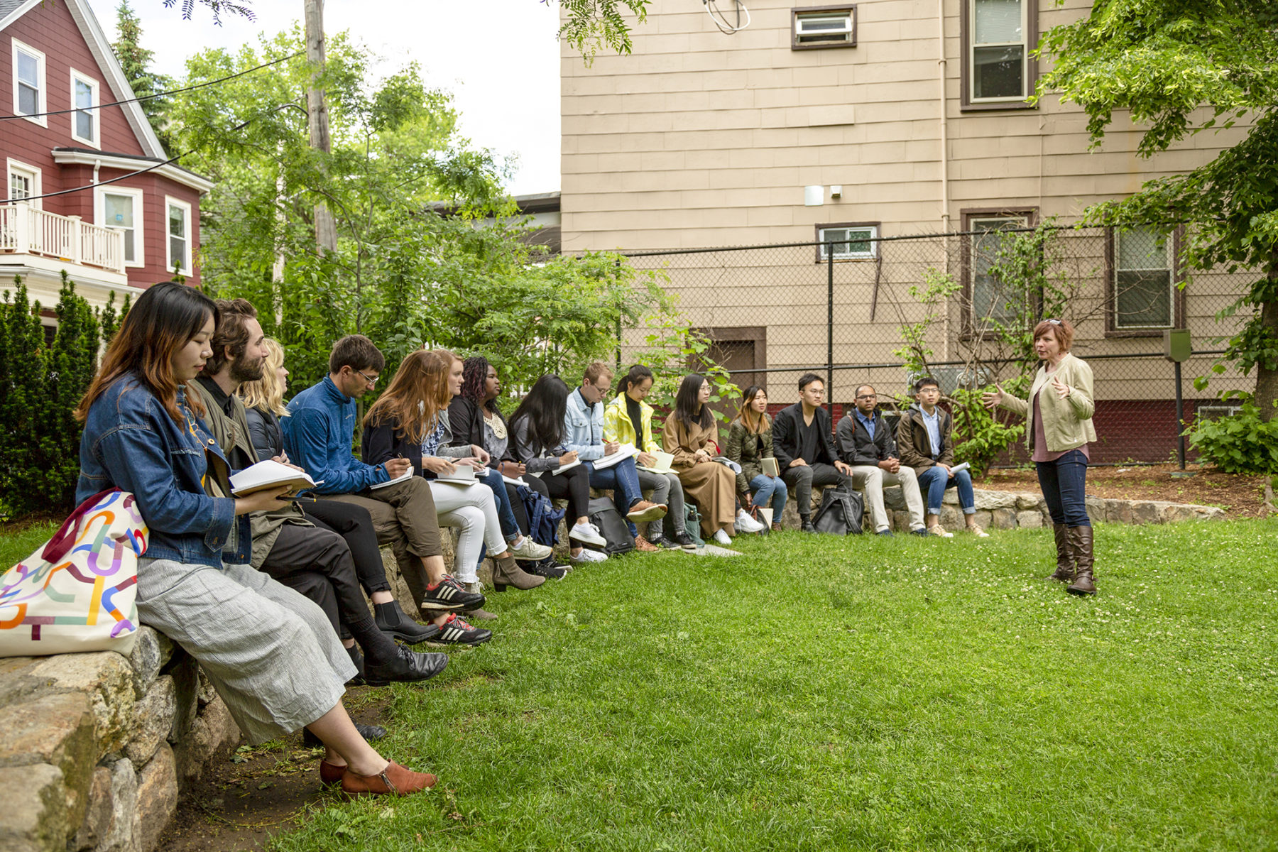 photo of interns sitting on a bench