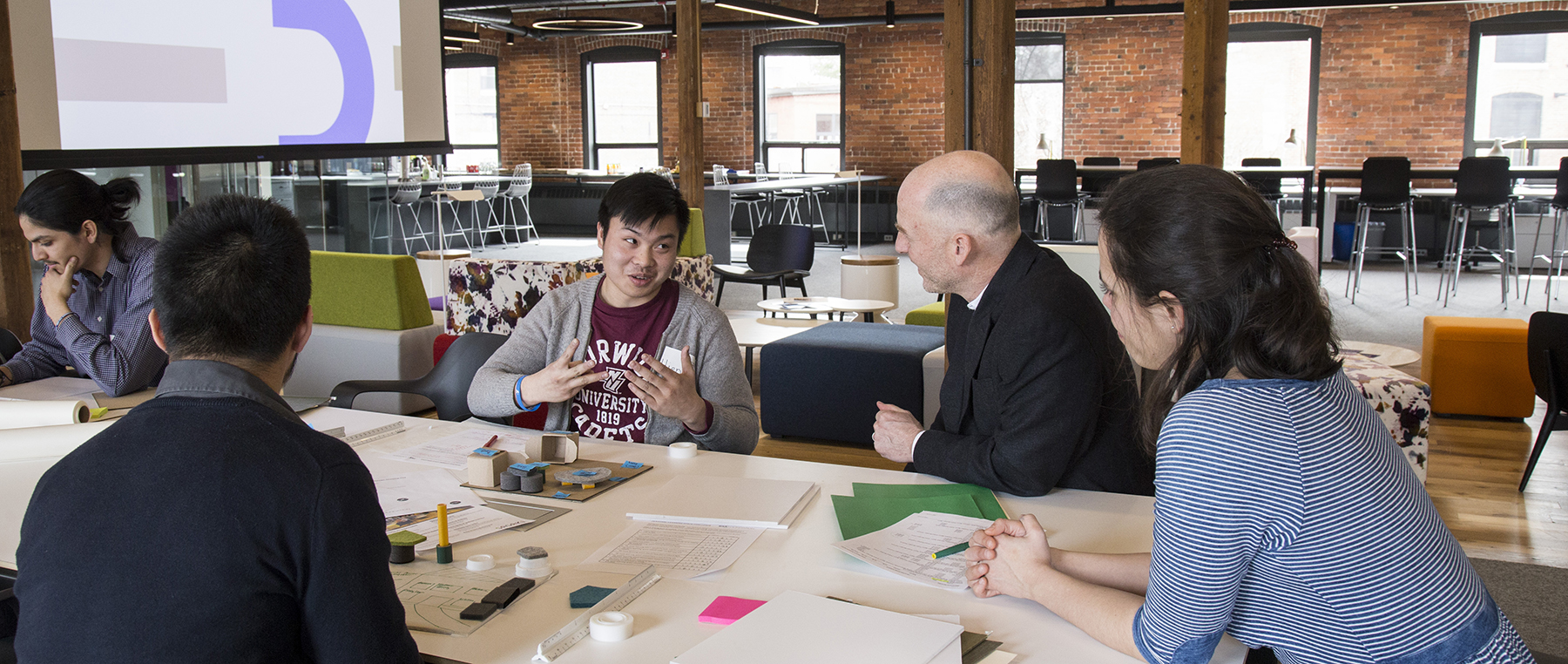 people talking at a table