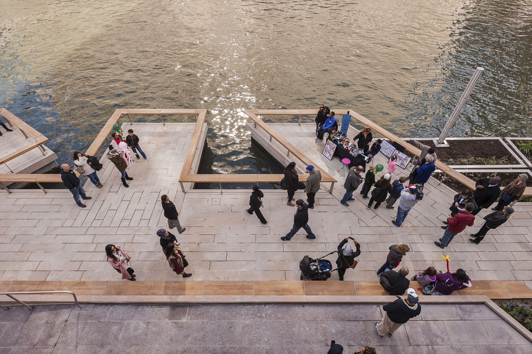 Overhead view of people standing on Riverwalk