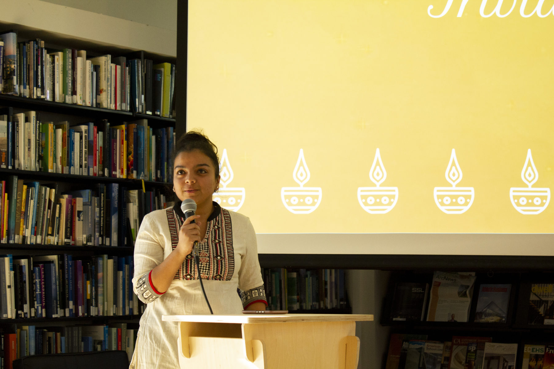 person standing at podium