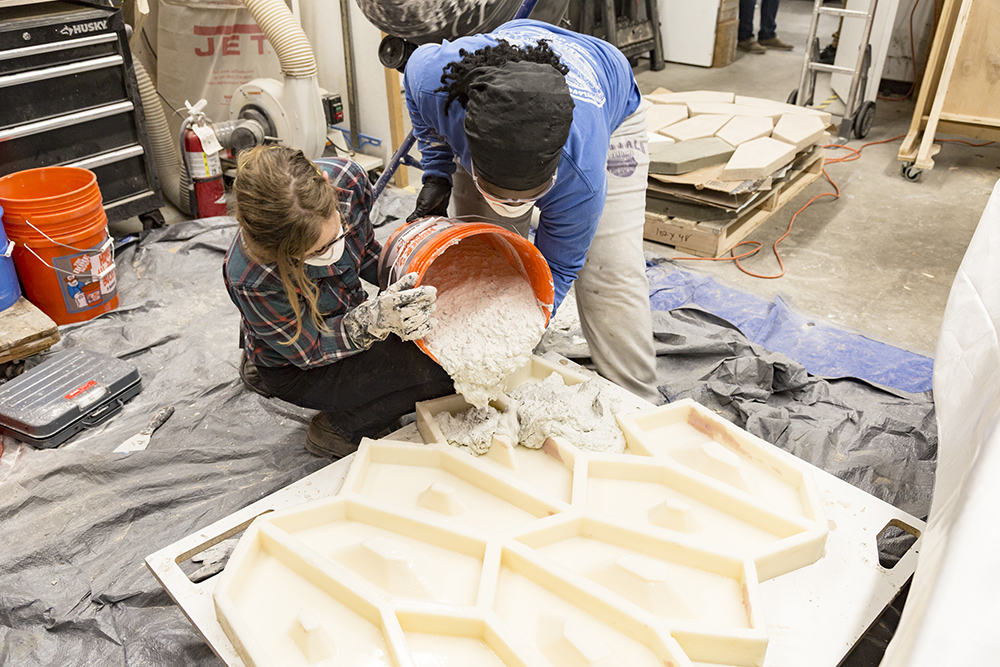 Pouring concrete in the Sasaki fabrication studio