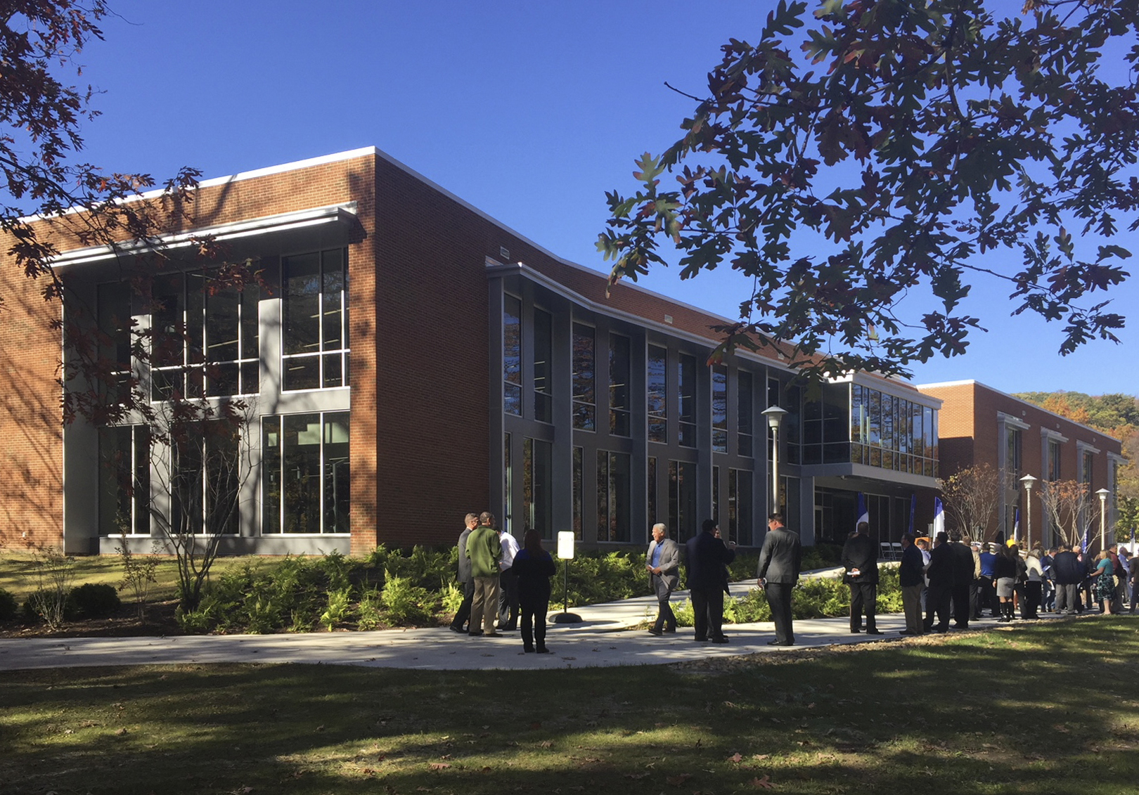 photo of people in front of academic building