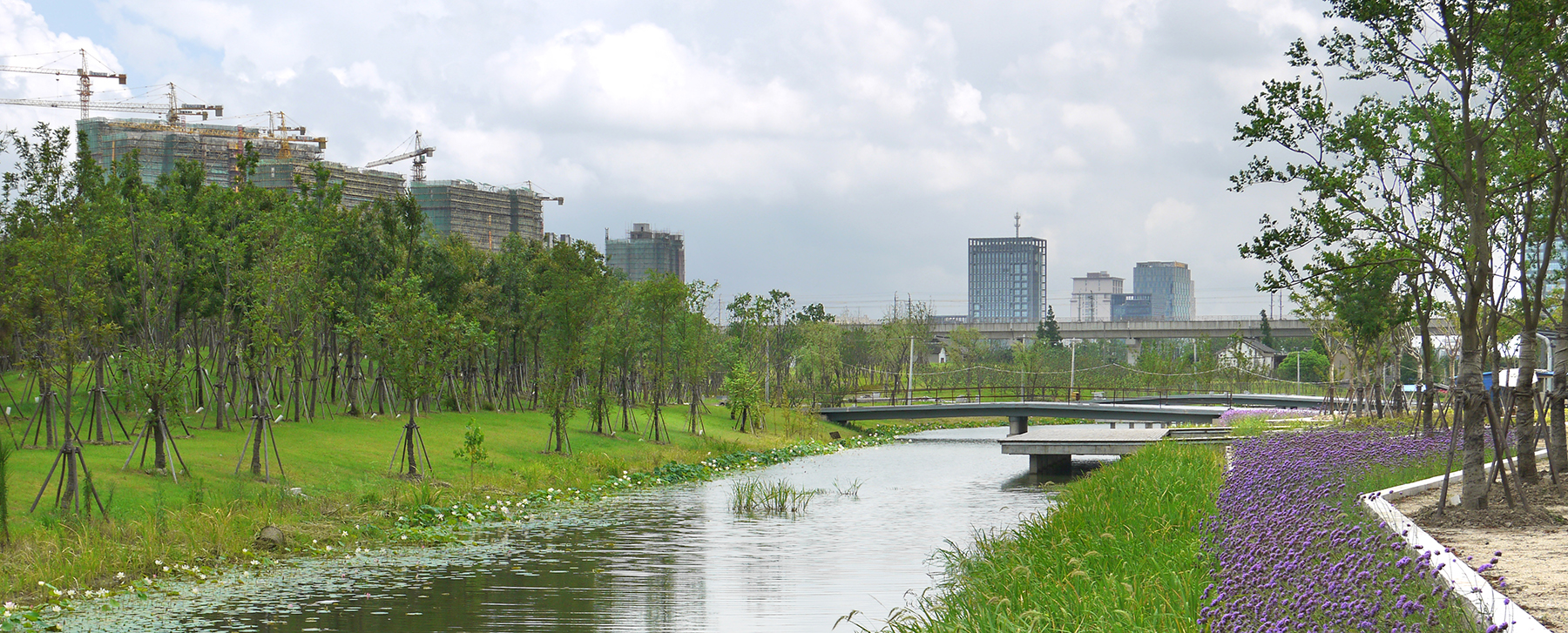 View of body of water with greenery on either side