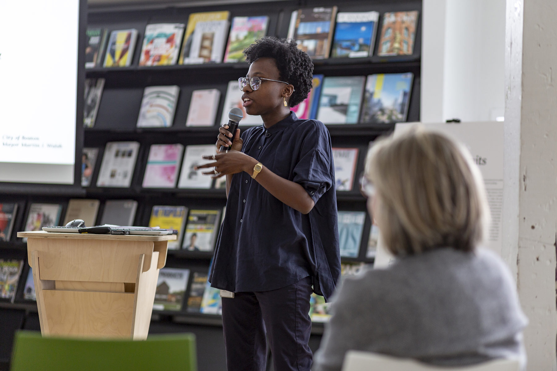 Sabrina Dorsainvil speaking to a group