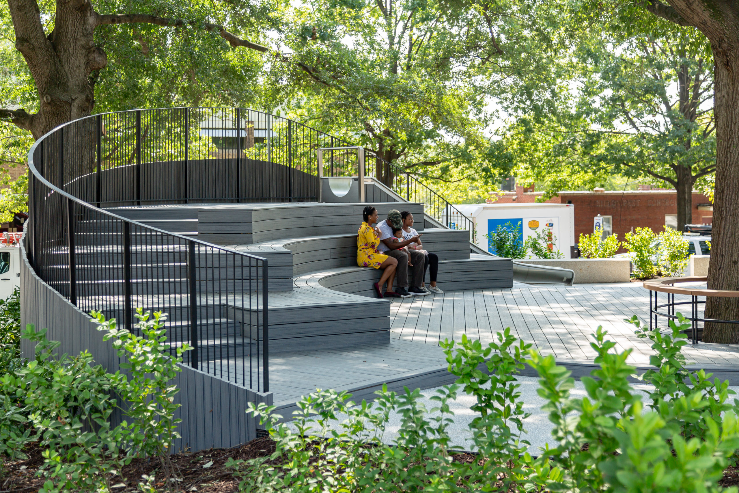 Family sitting together on new arena-style seating area