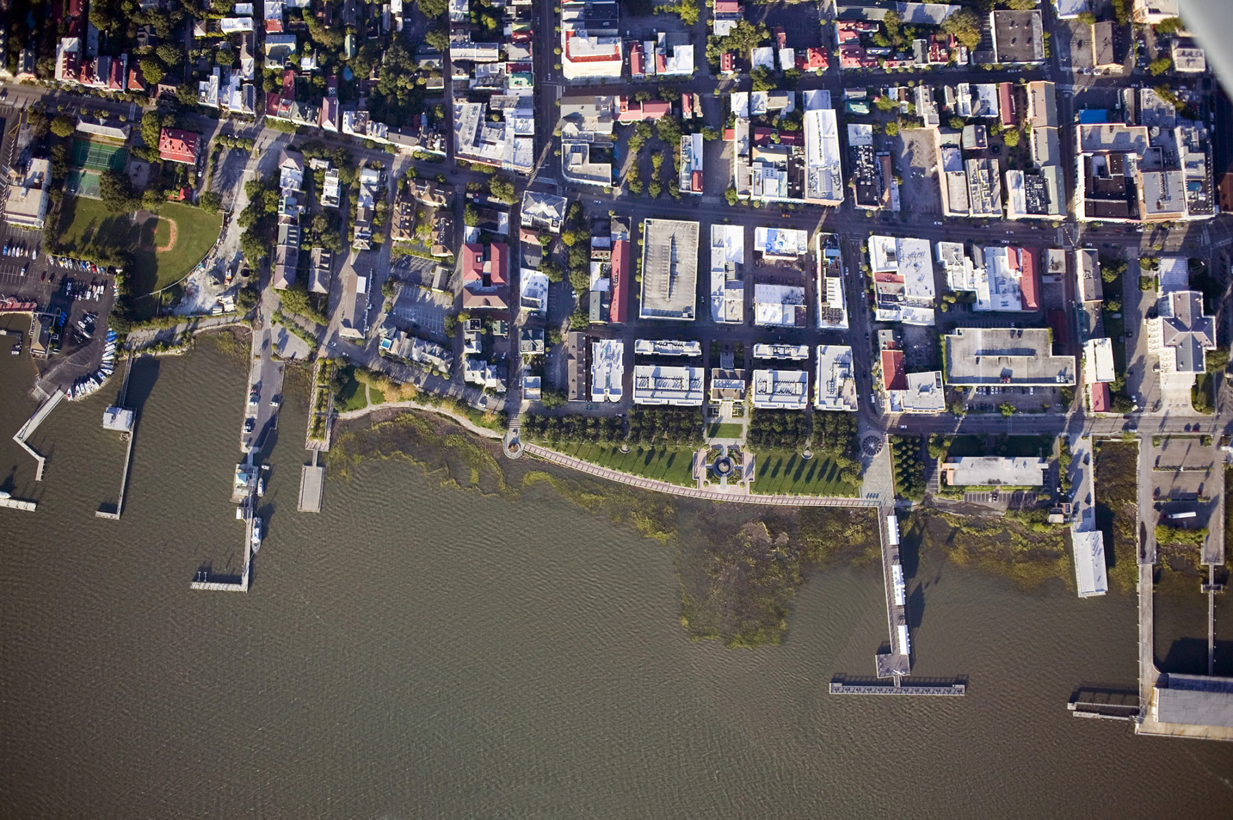 Aerial photo of waterfront, park, and city development