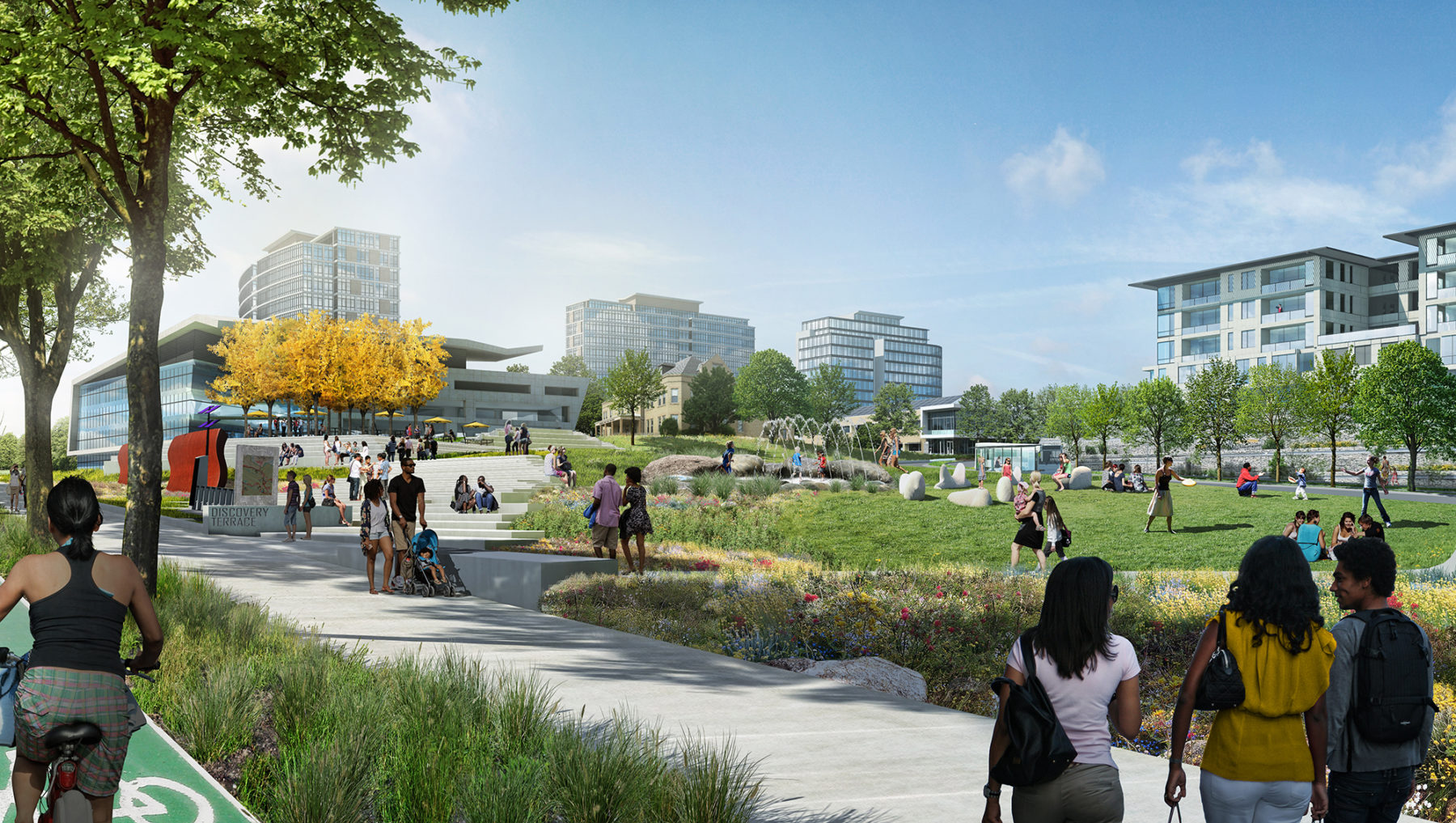 People enjoying the park in front of the medical center