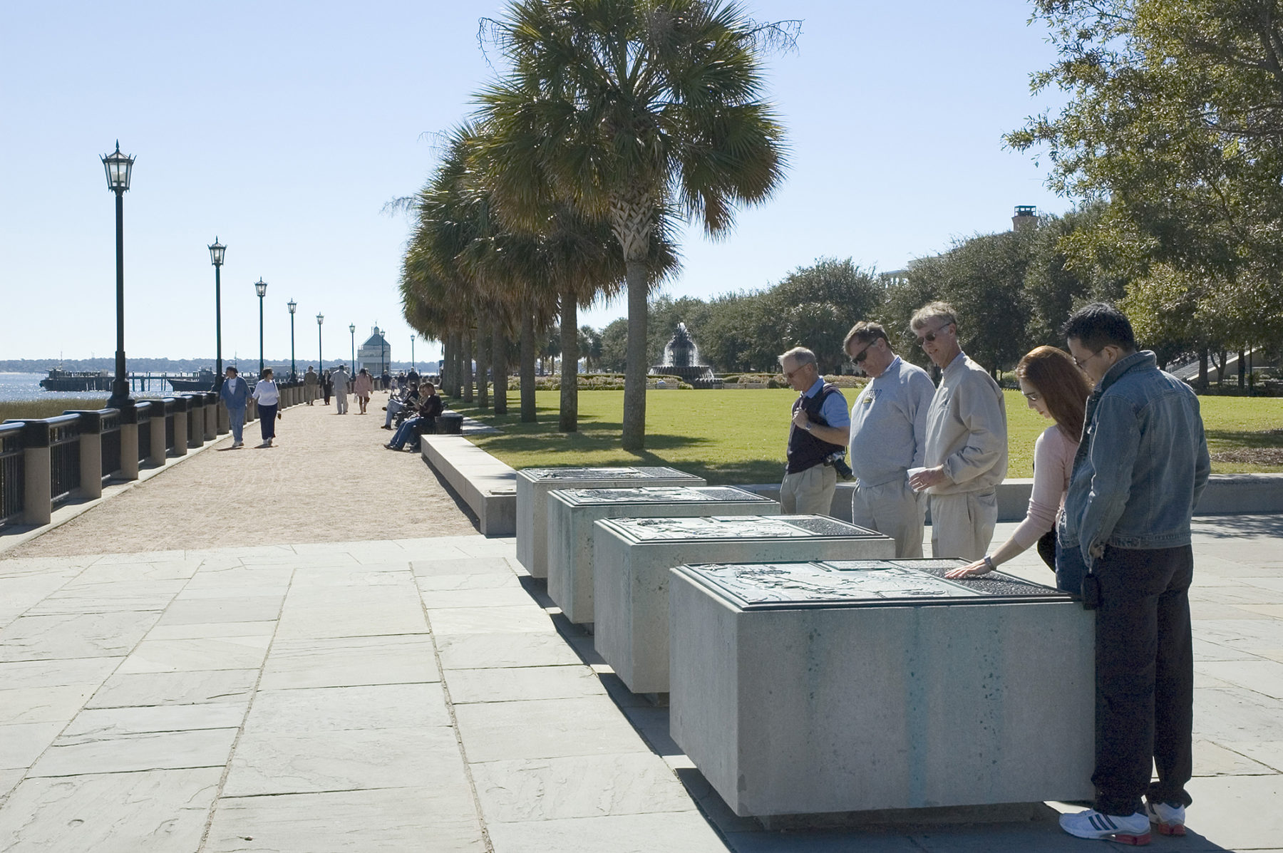 Photo of people reading about the history of the park