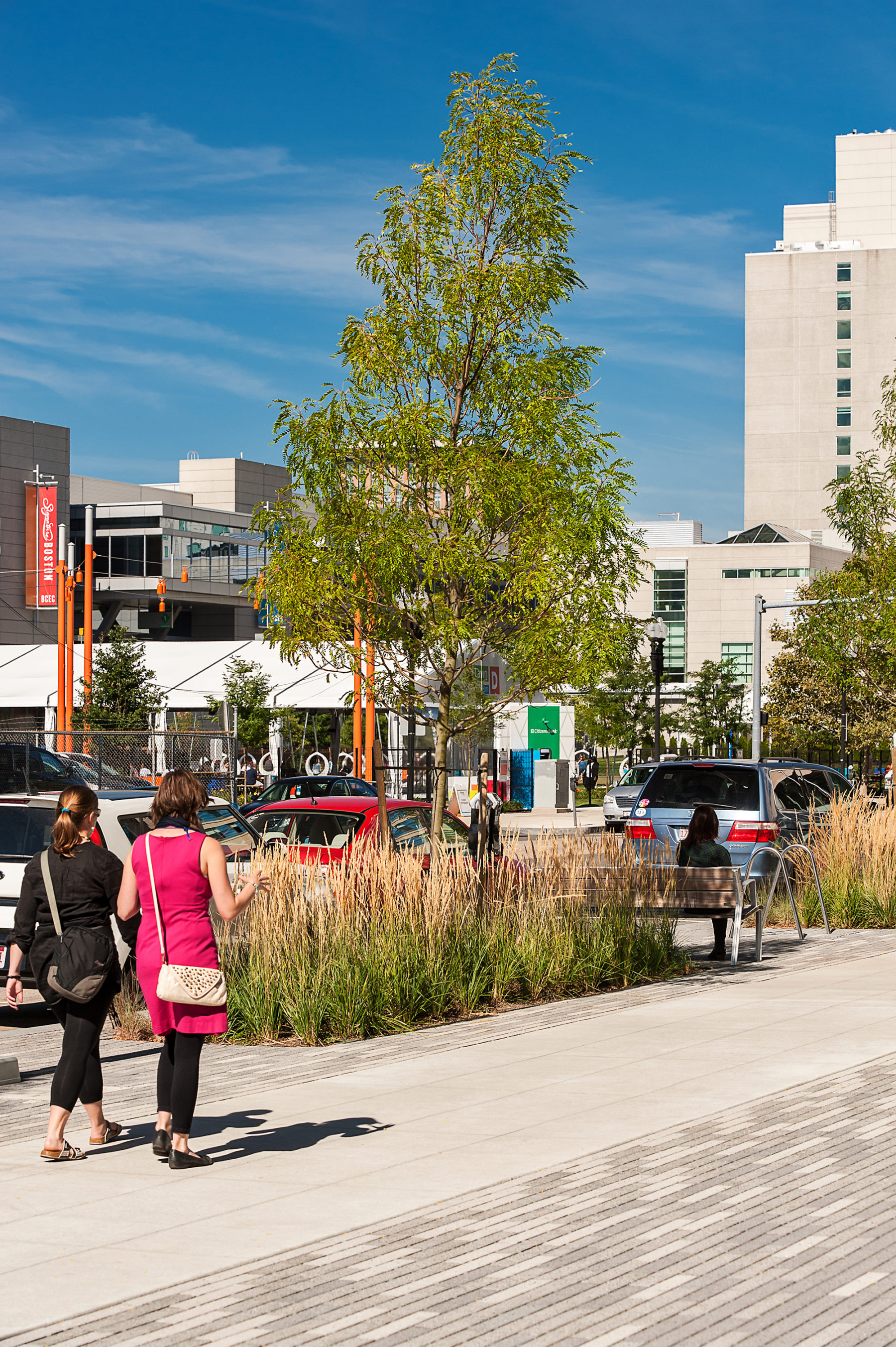 Photo of people walking on the along the built vision for the corridor