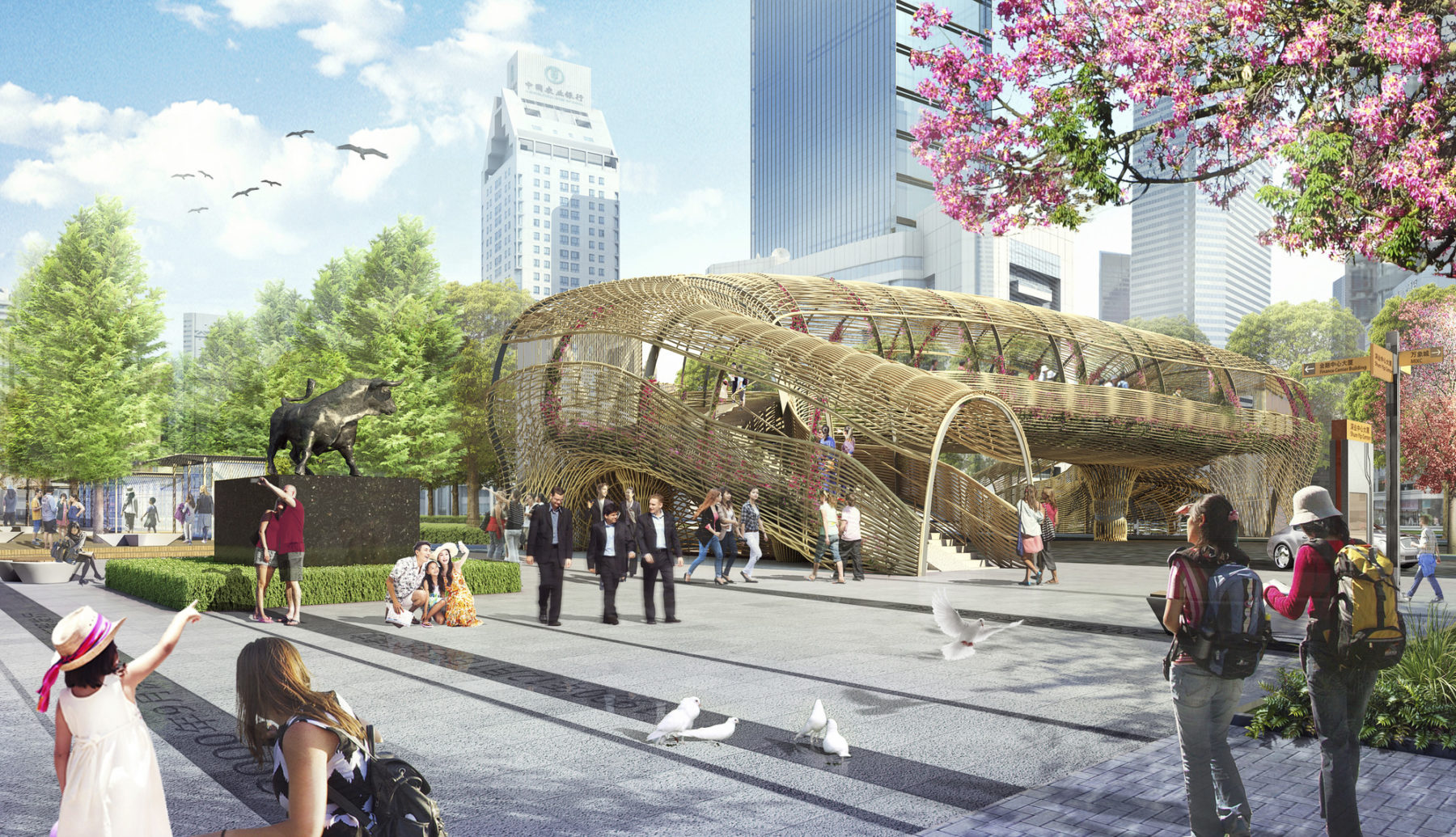 Crowds walking through the park. New tunnel walkway in the background symbolizing the new Artery of Life