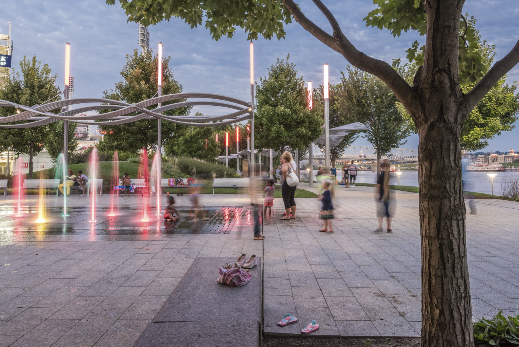 Fountains light up in red, pink, yellow, and green