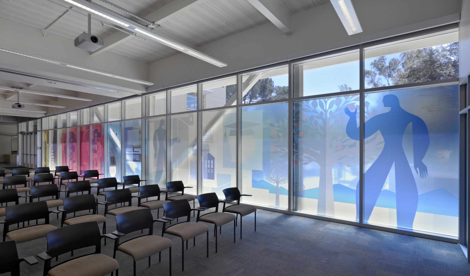 Interior photo of classroom looking at fritted screen