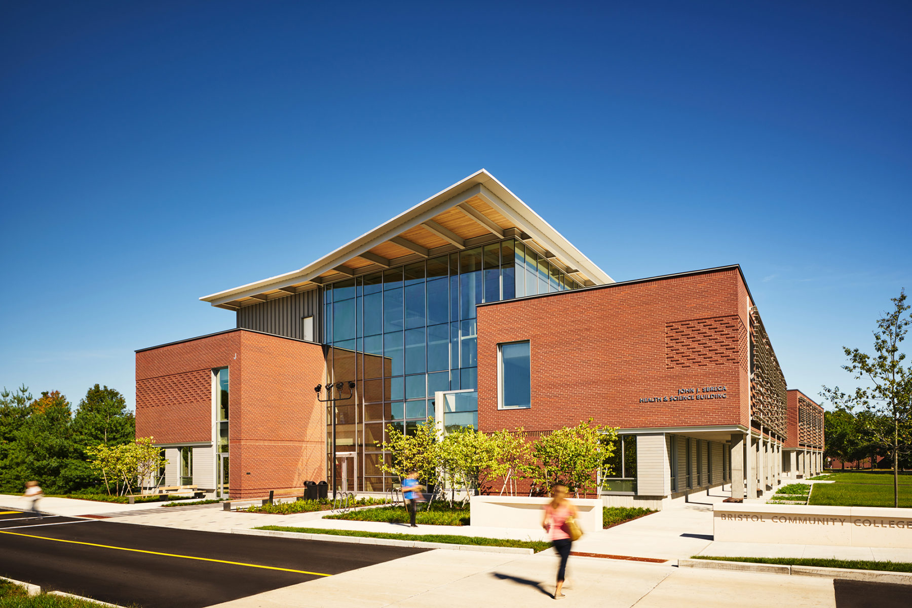 Exterior of building with people walking past