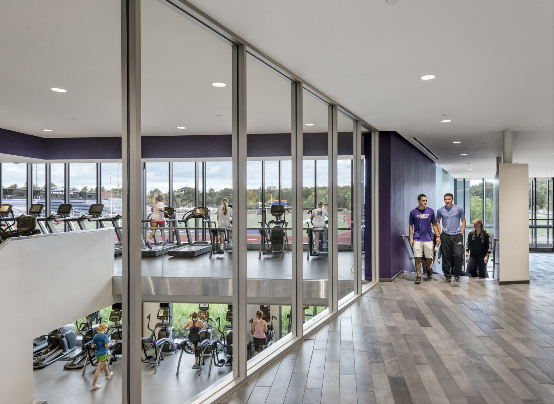 glass walls look onto cardio equipment