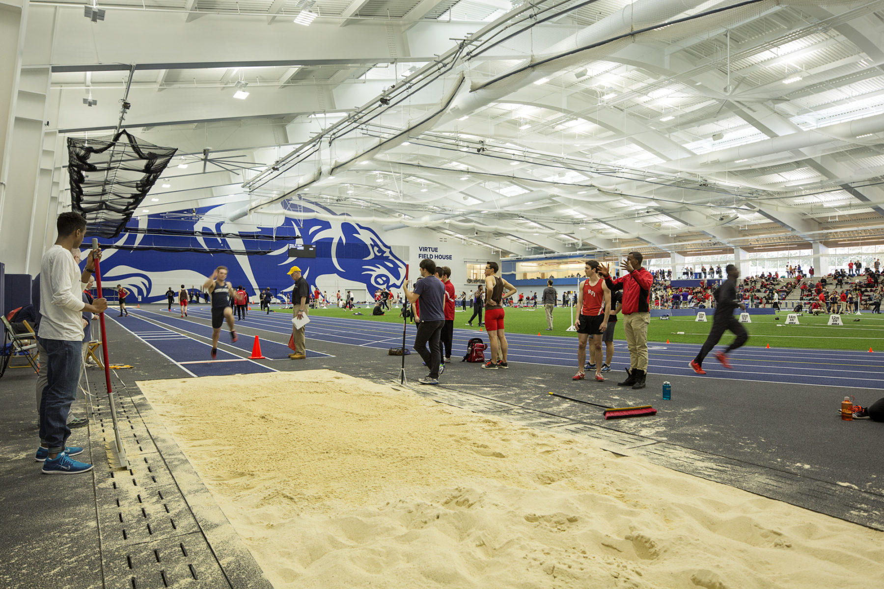 A long jumper approaches the pit