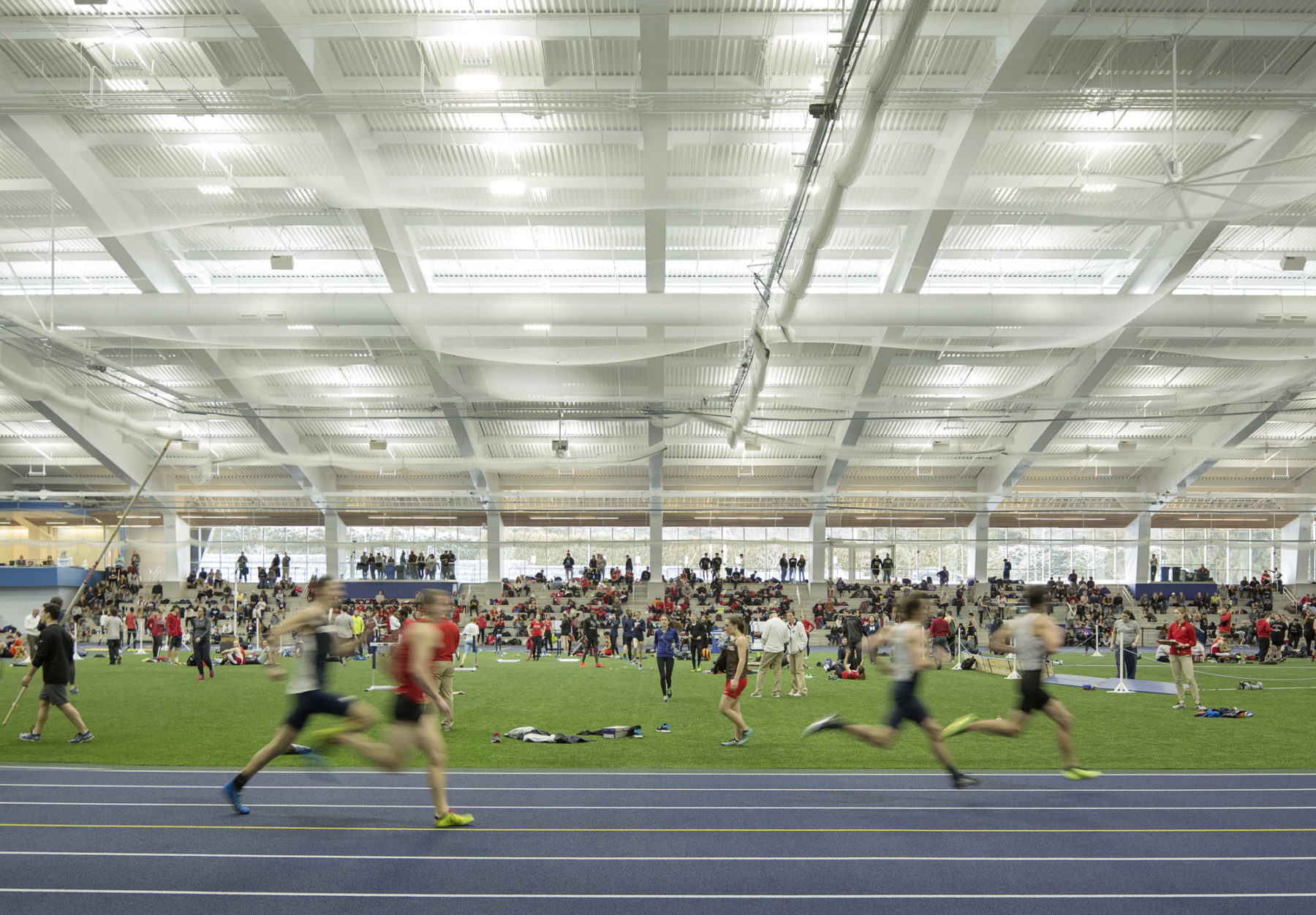 runners on an indoor track