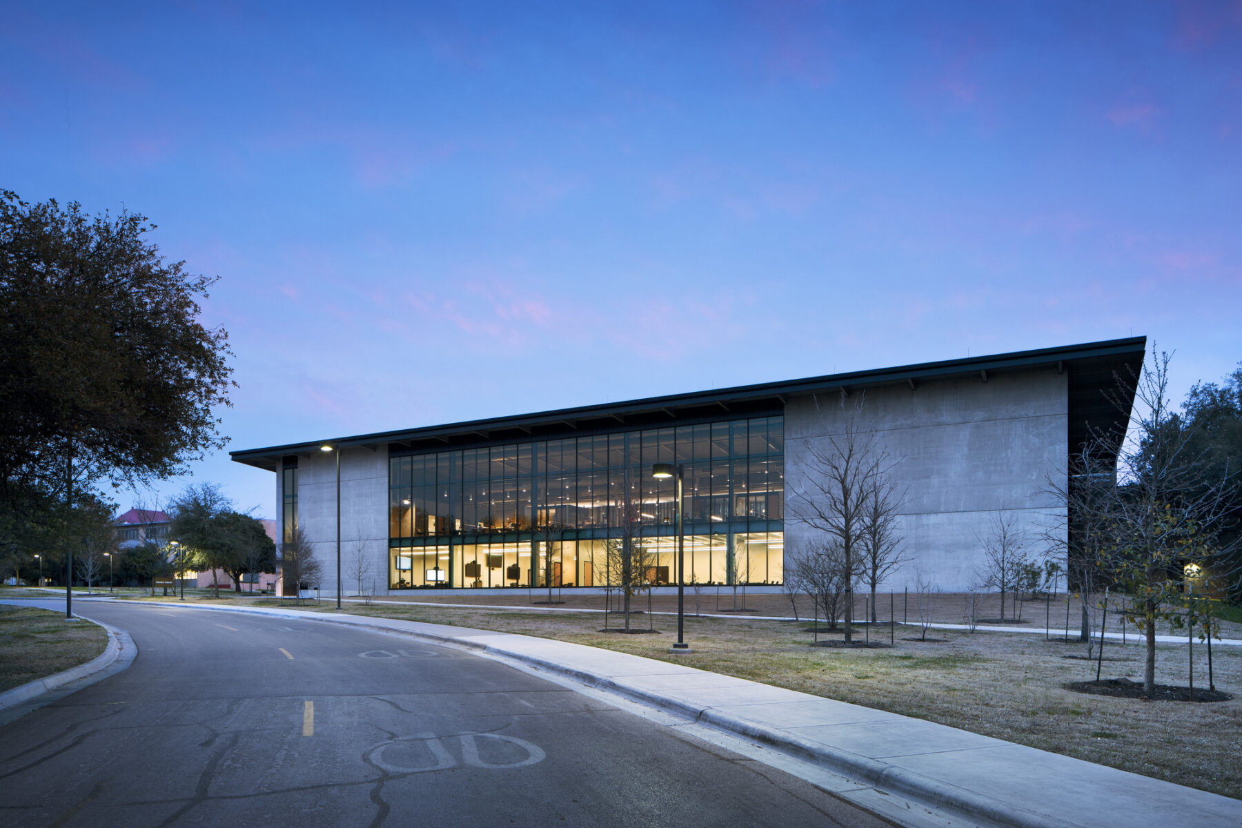 Perspective photograph of exterior library at dawn