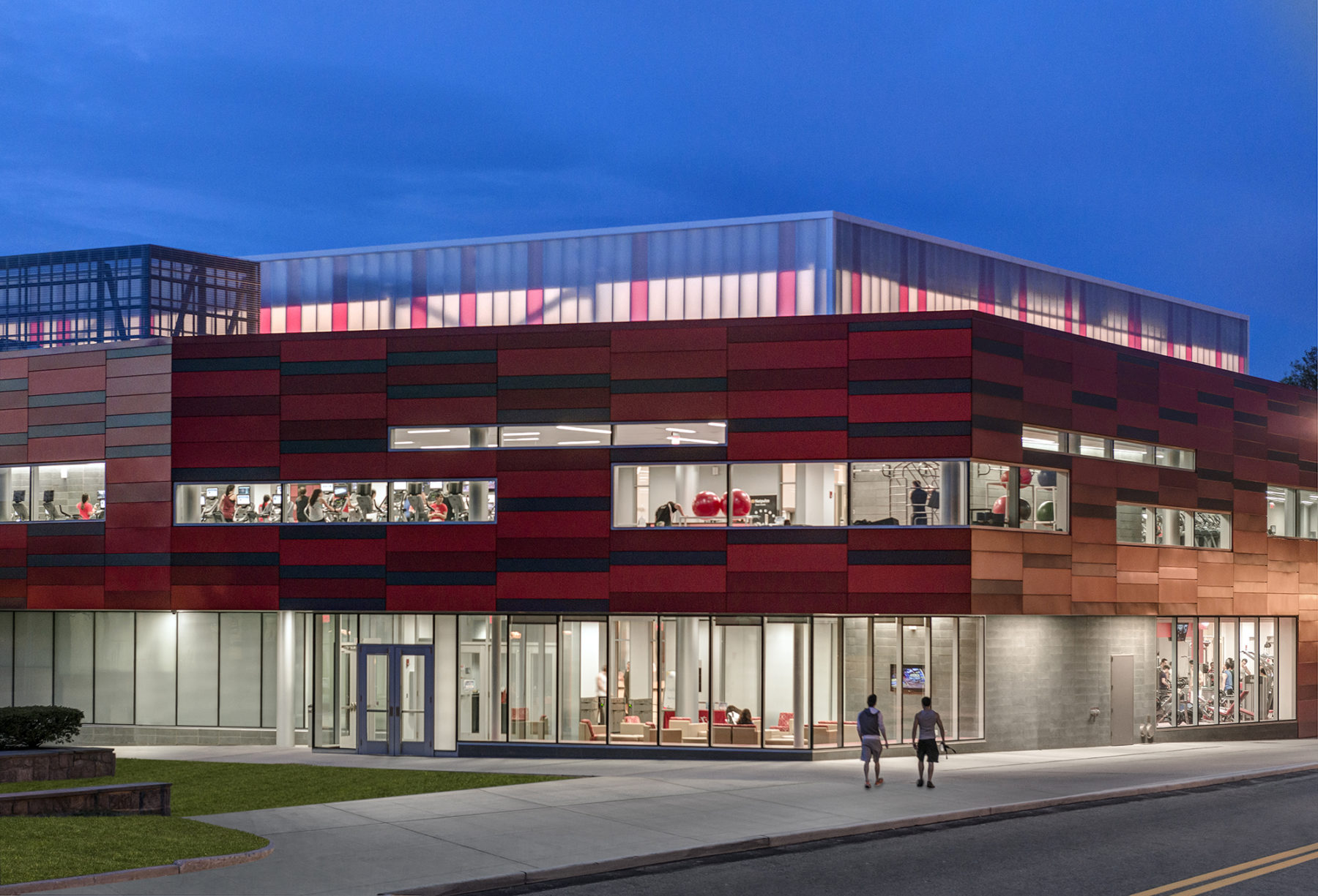 perspective photograph of recreation center facade during night time