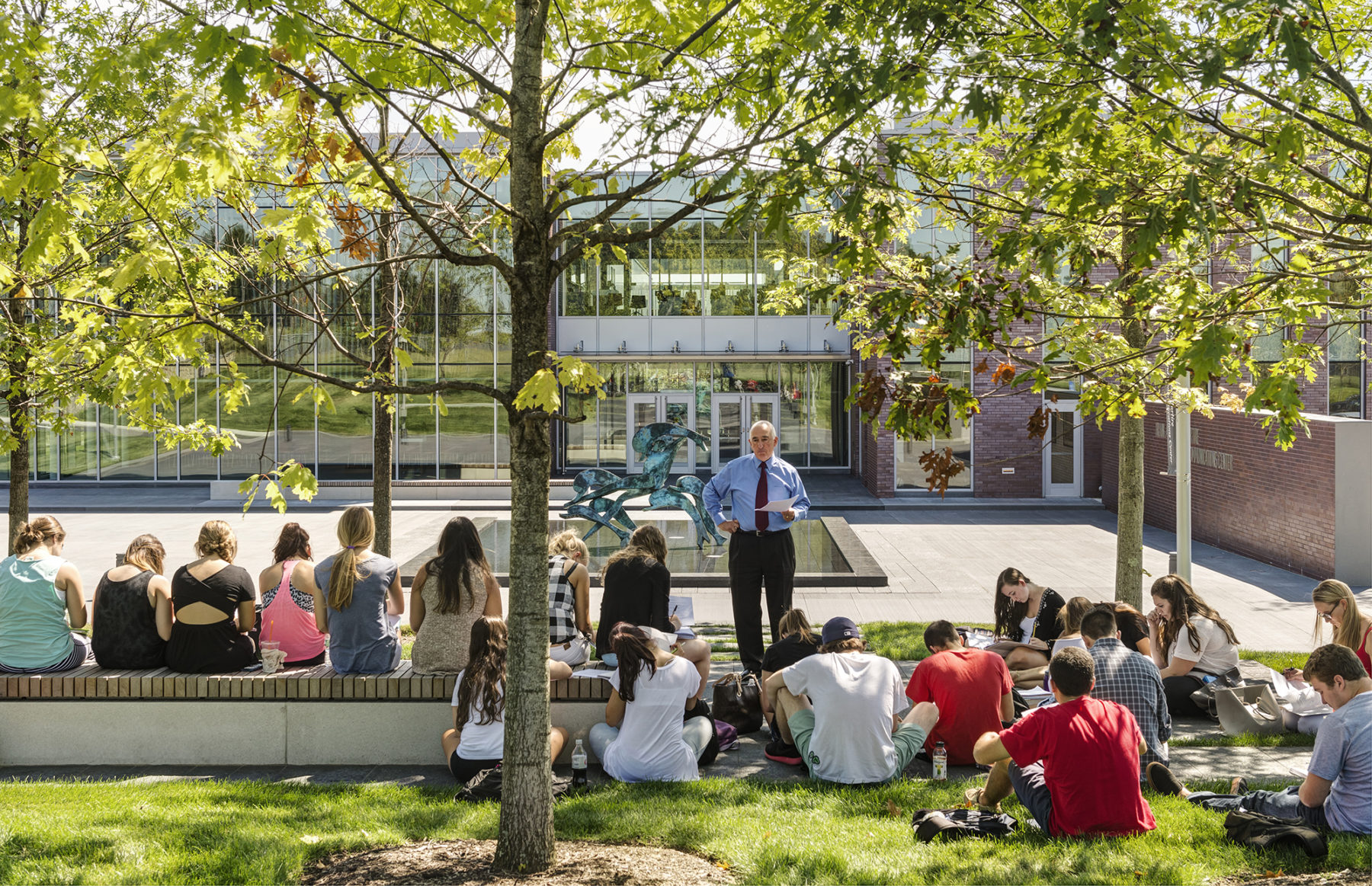 people sitting in front of a building