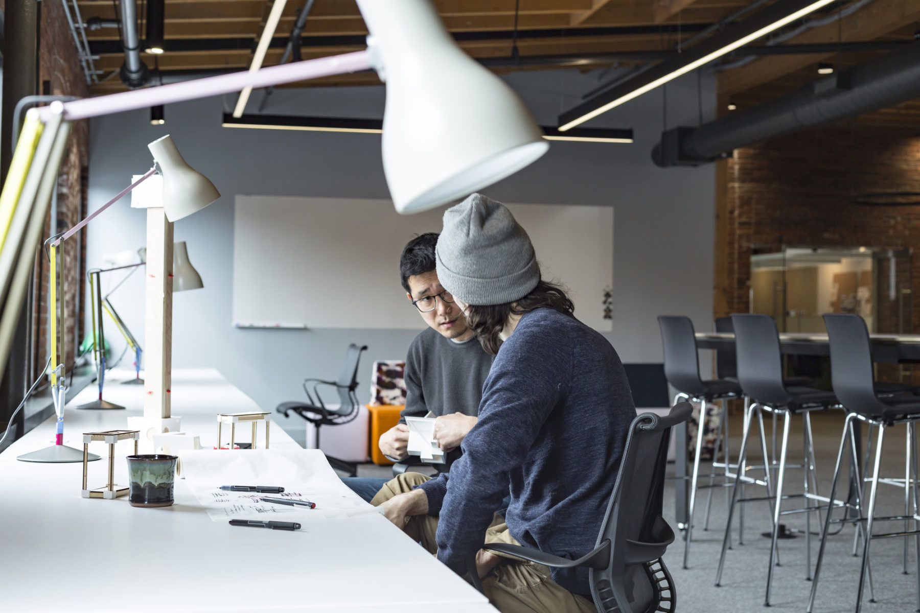 two people working at a table