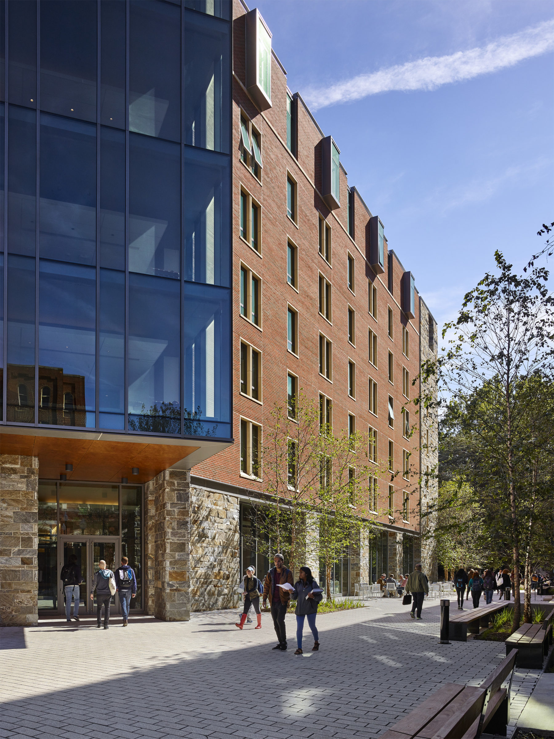 Photo of building with people walking past