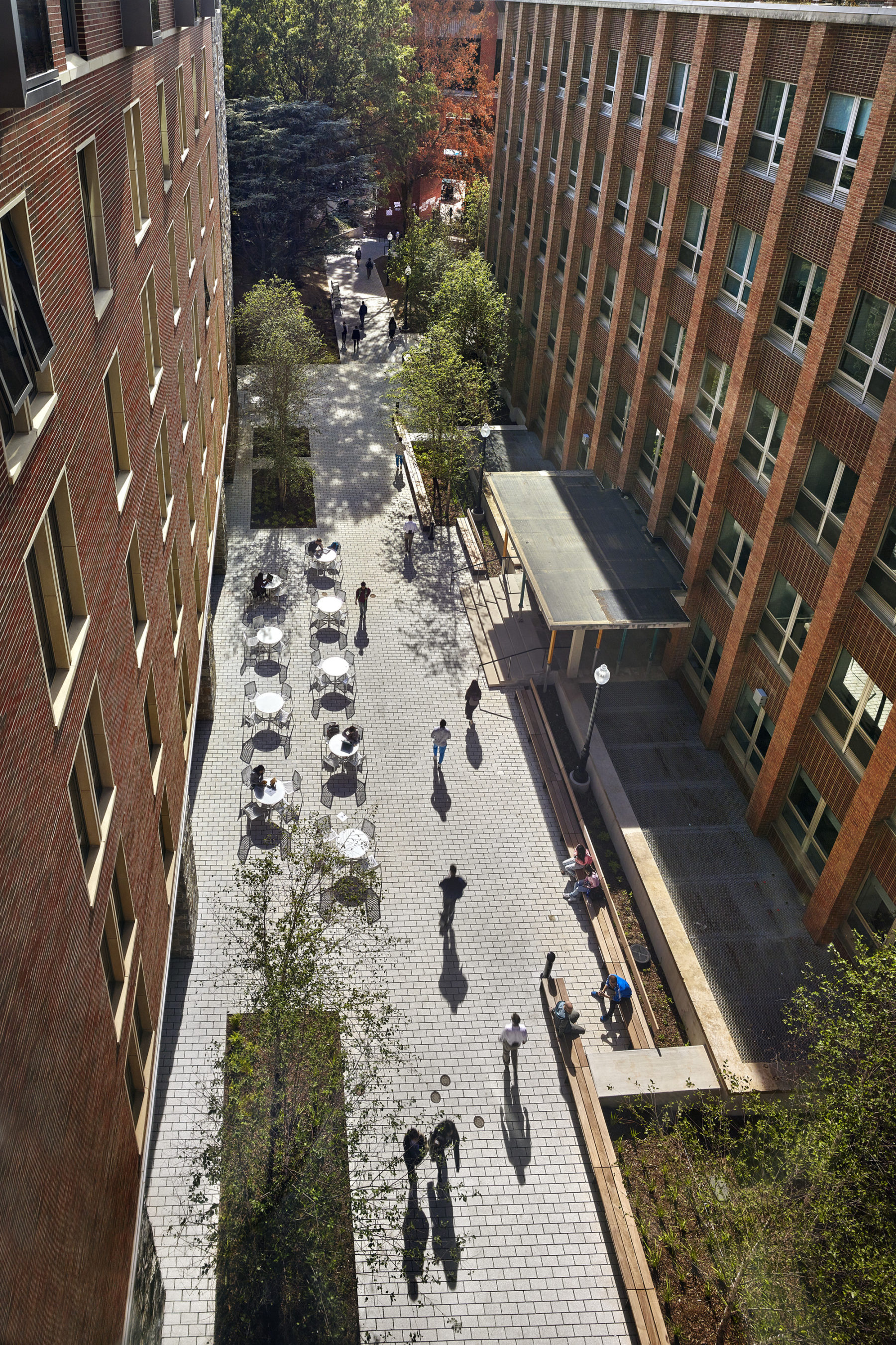 Overhead view of people walking in plaza