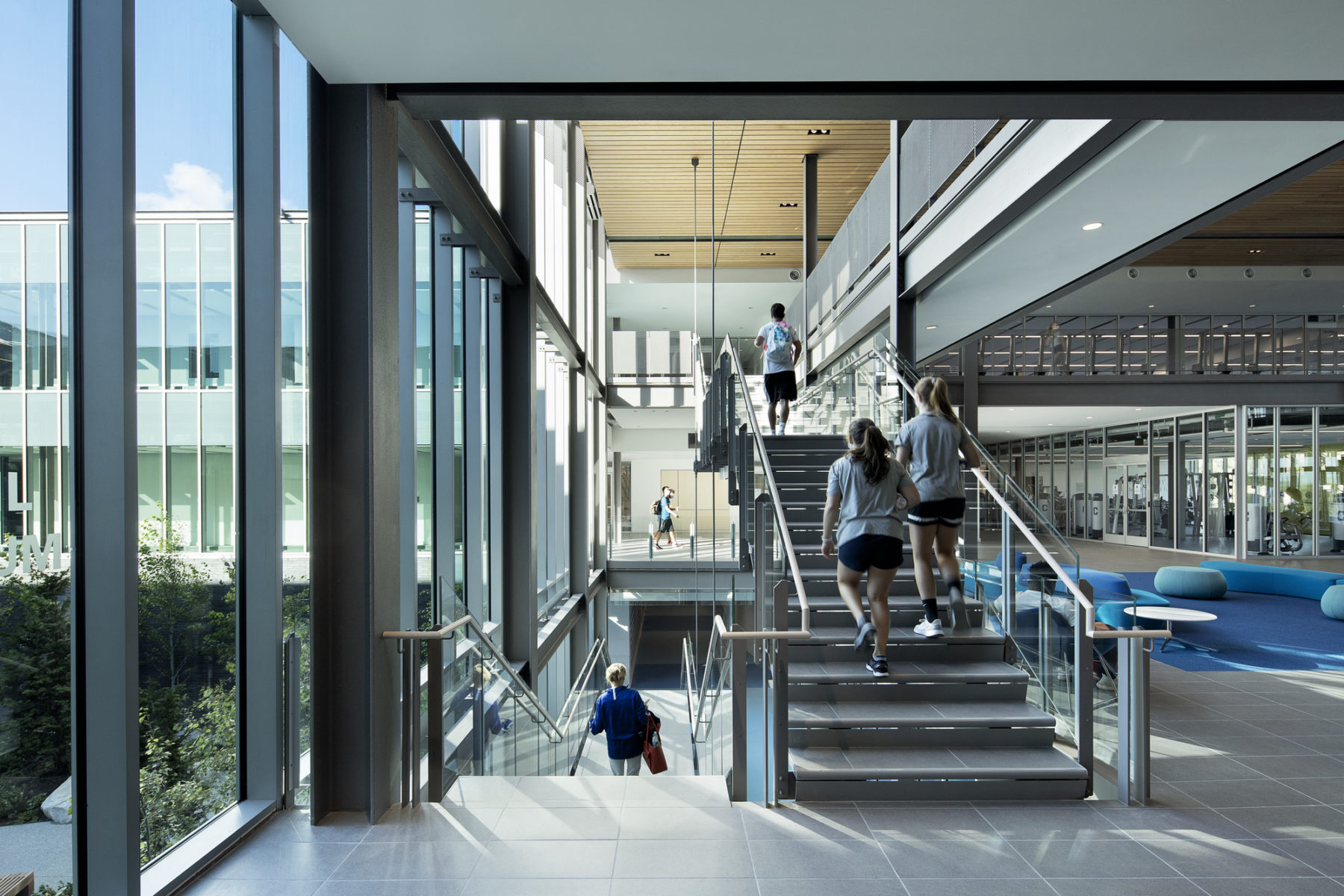 interior photo of stair, students walking up and down