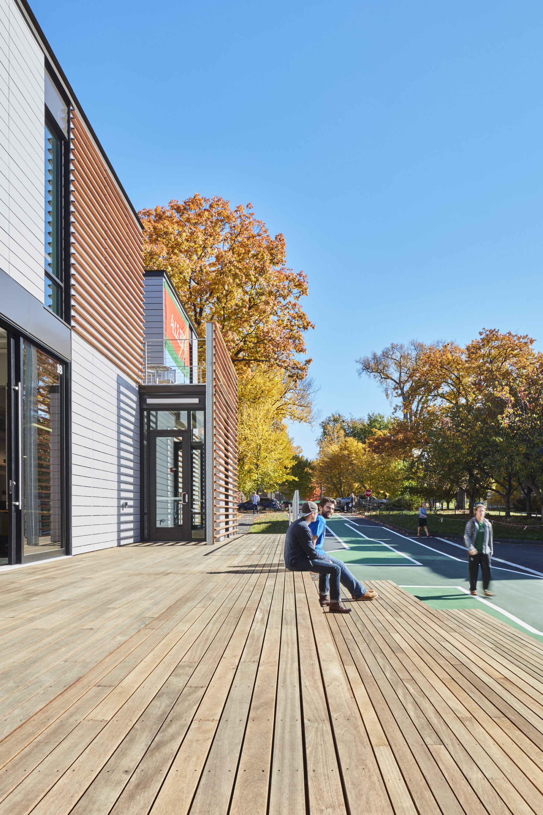 students sitting outside on patio