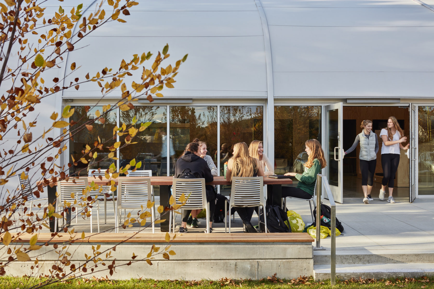 People sitting outside on a plaza