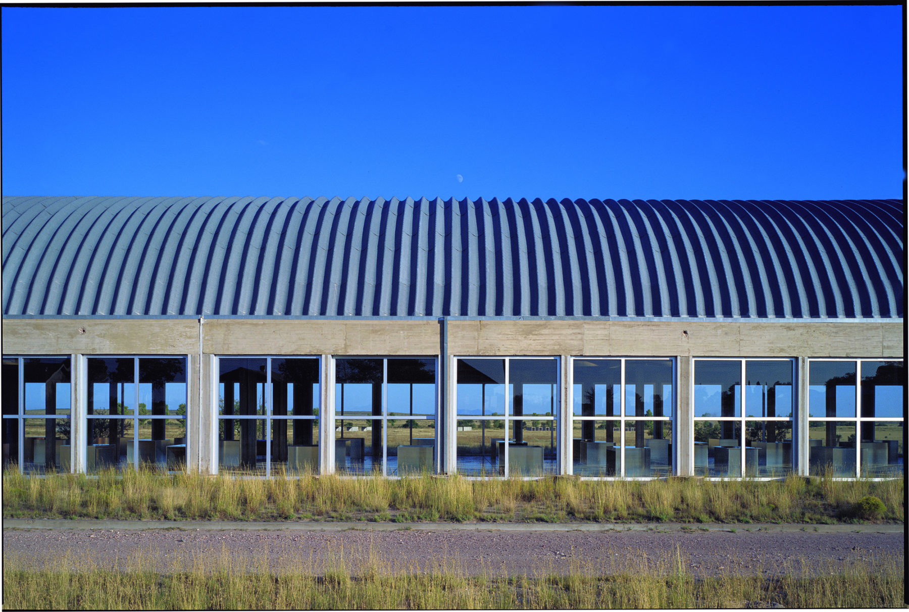 Exterior view of building with arch roof