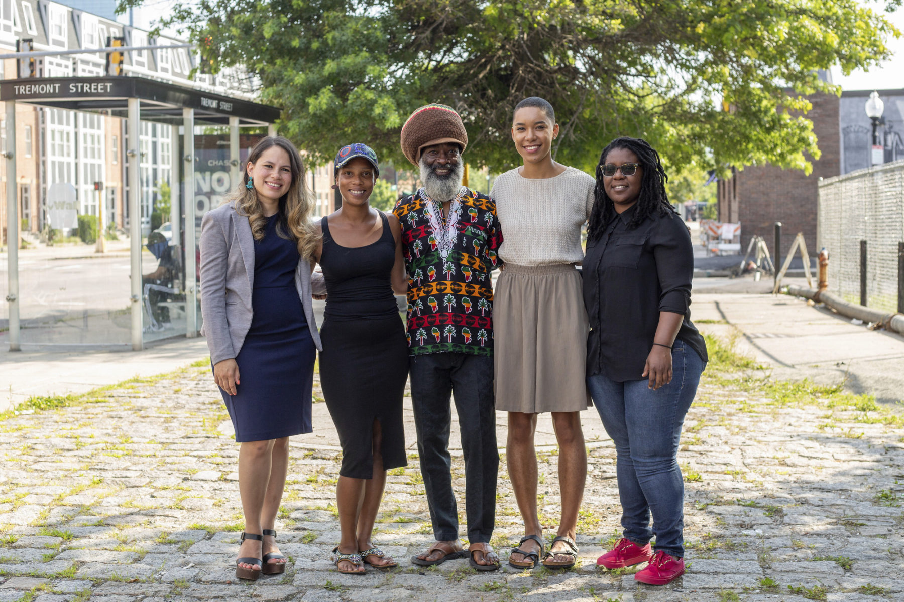 A group stands at the future site of the Frederick Douglas memorial