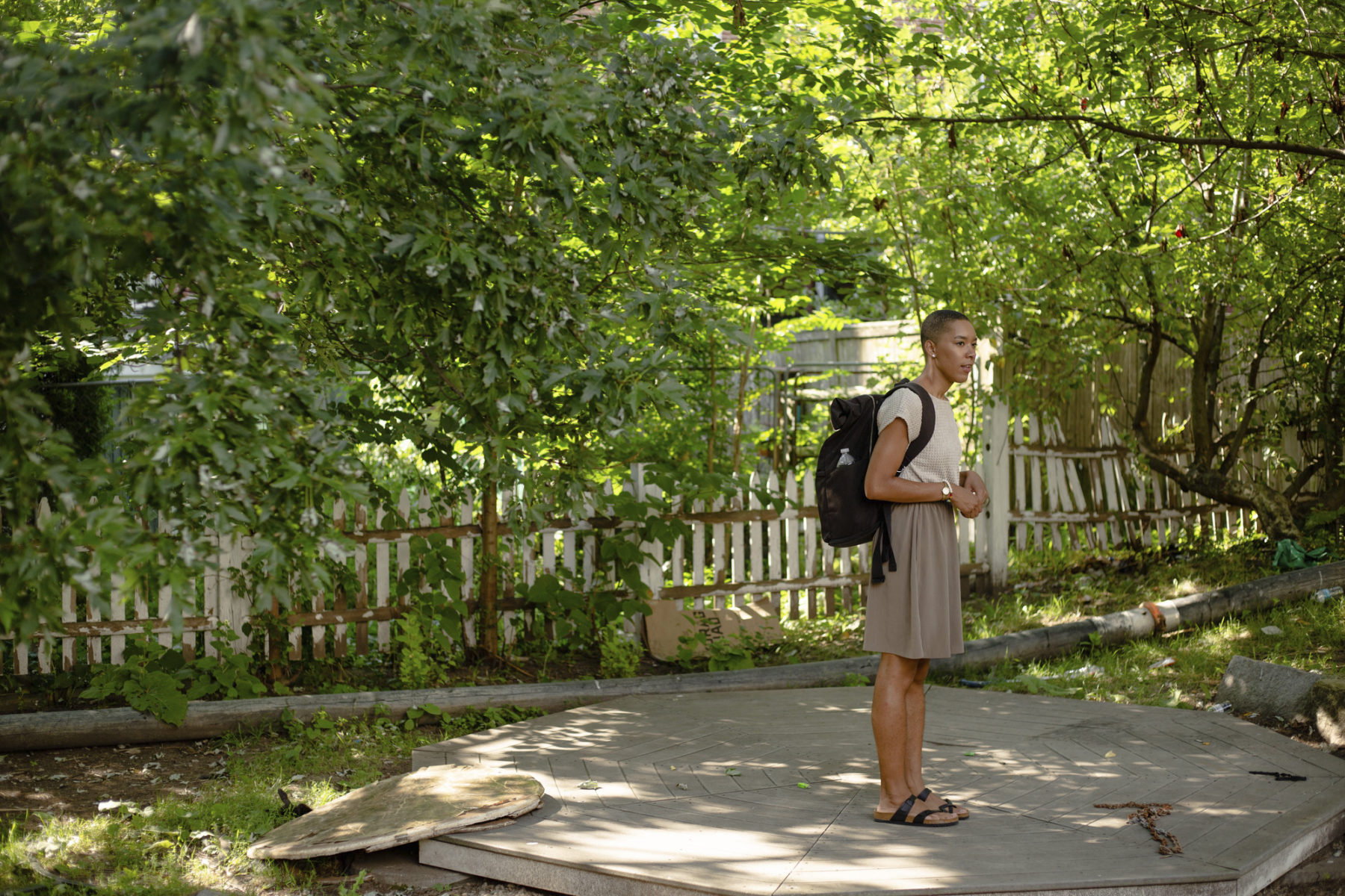 A person stands in a park