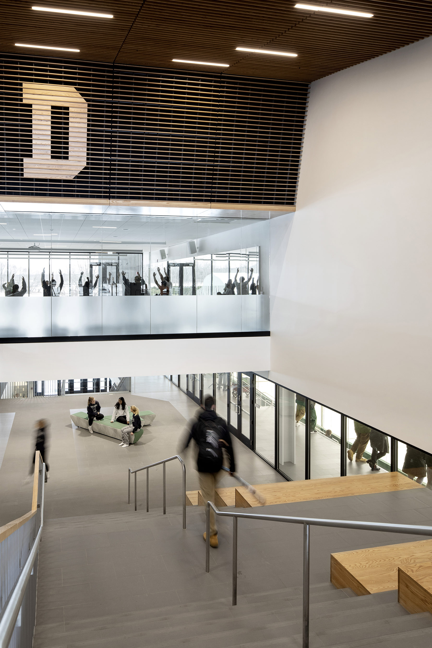 staircase with people walking down it