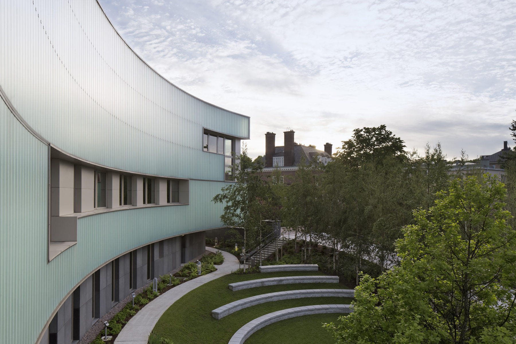 exterior facade photo of embassy, showing courtyard below