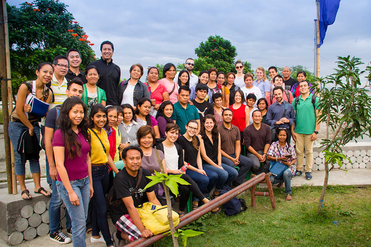 Large group including Ocampo and MIT students on a trip.