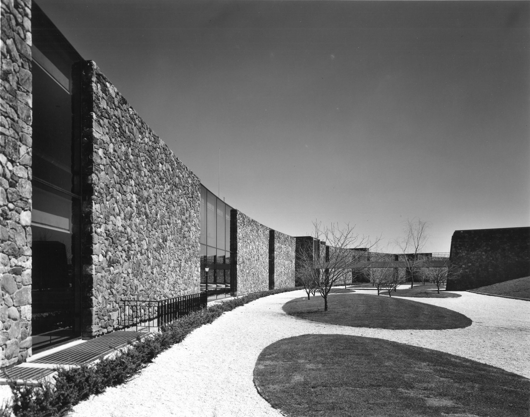 Black and white photo of paved courtyard