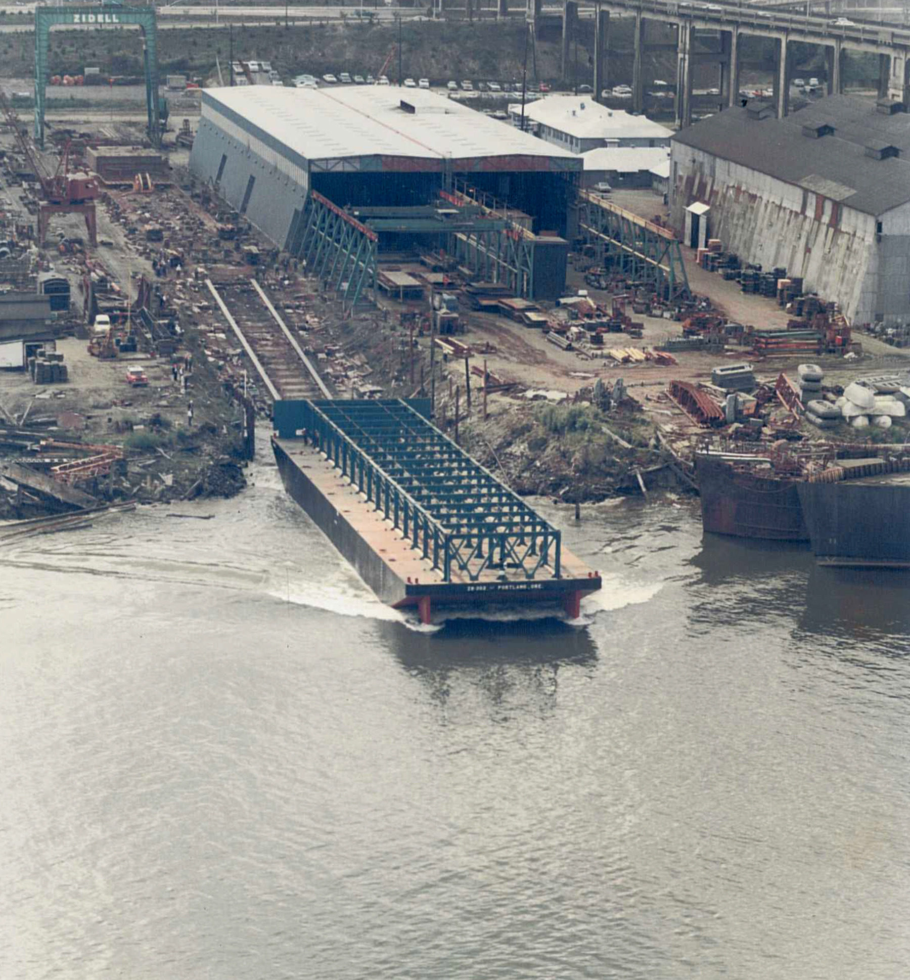 Photo of existing condition: close-up of industrial site along the water