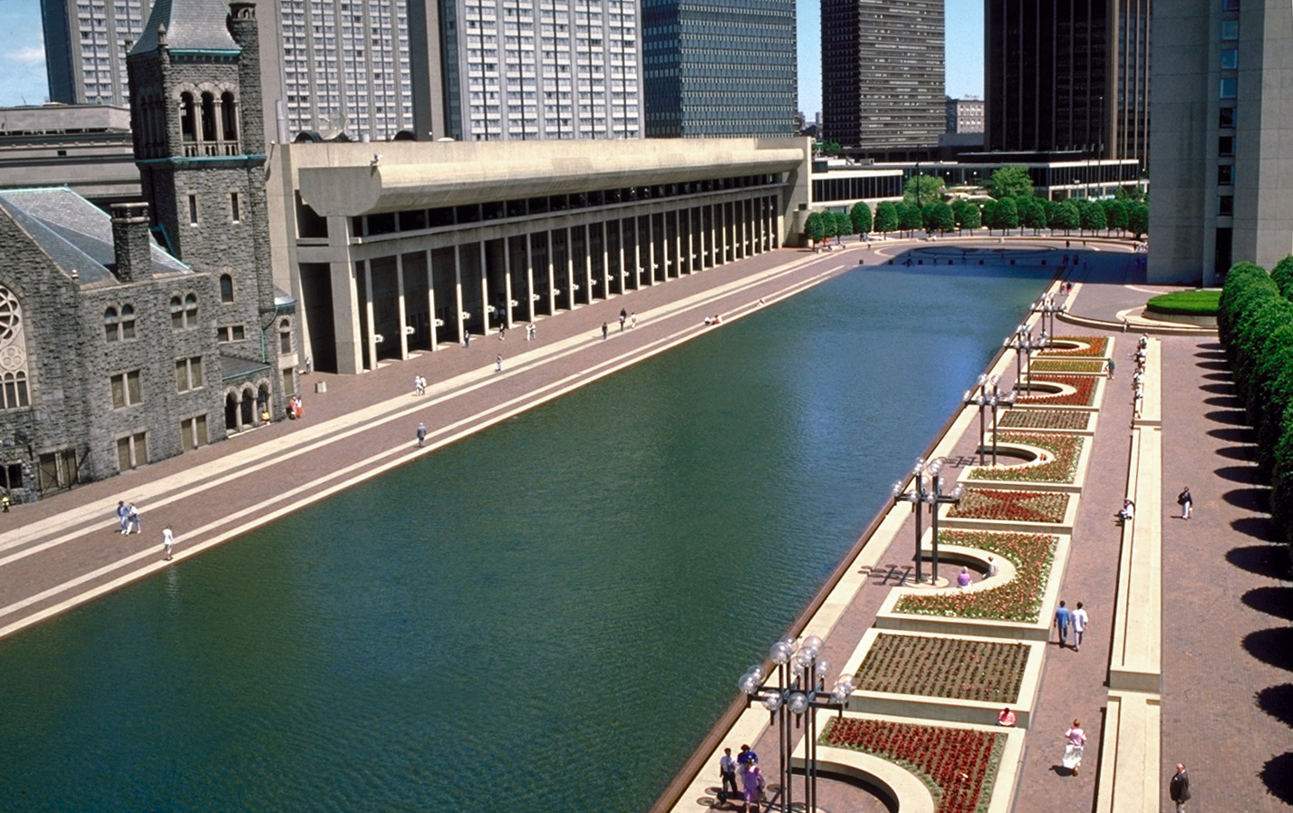 aerial photography of reflecting pool with views towards publishing house and prudential center