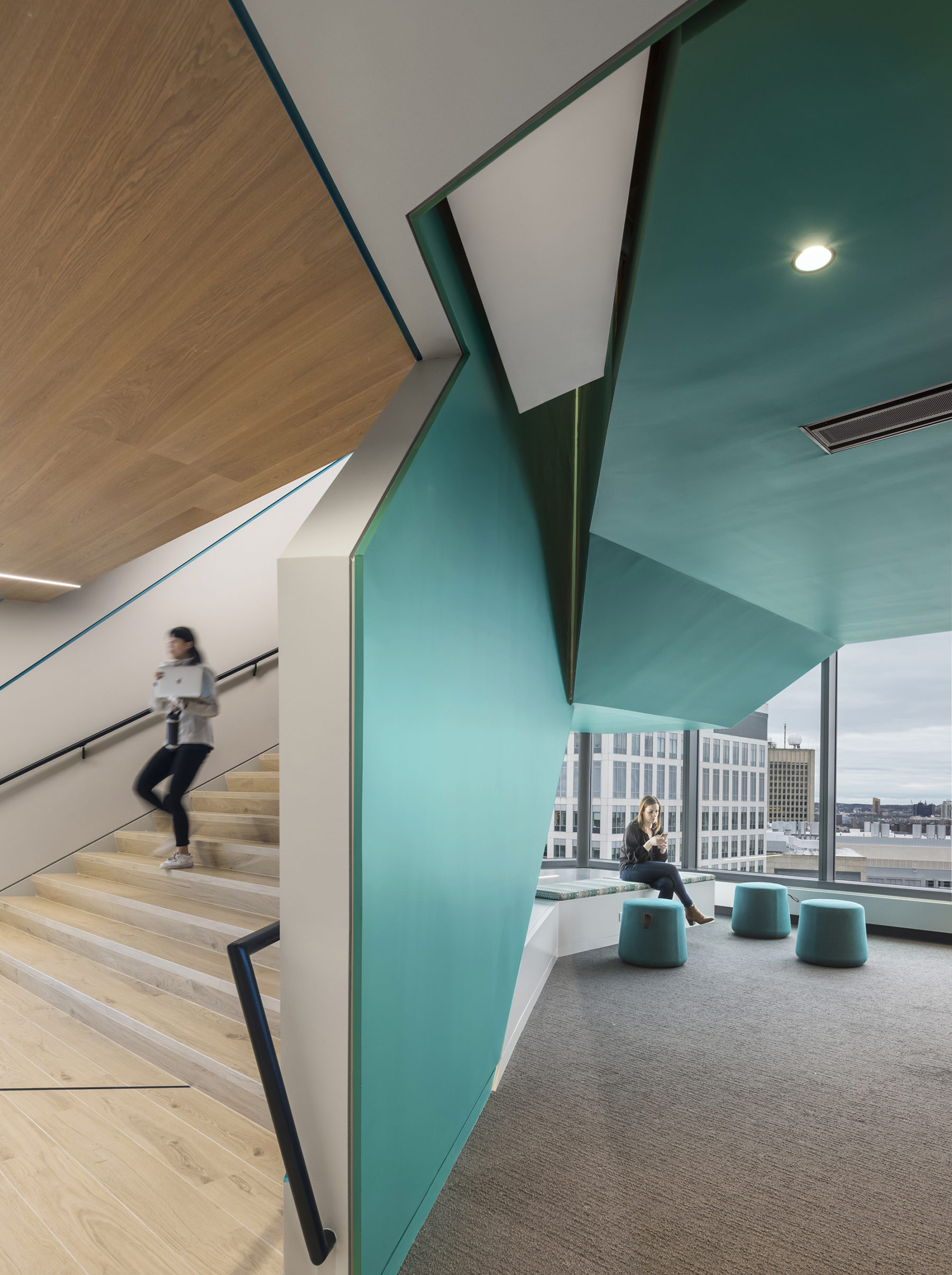 a small seating area under a stairway