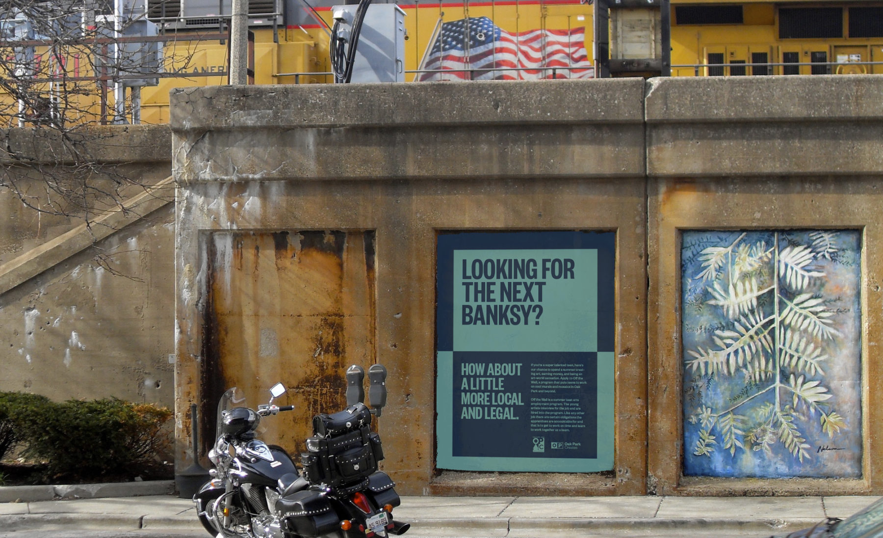 Oak Park branded poster shown as a billboard on an exterior wall