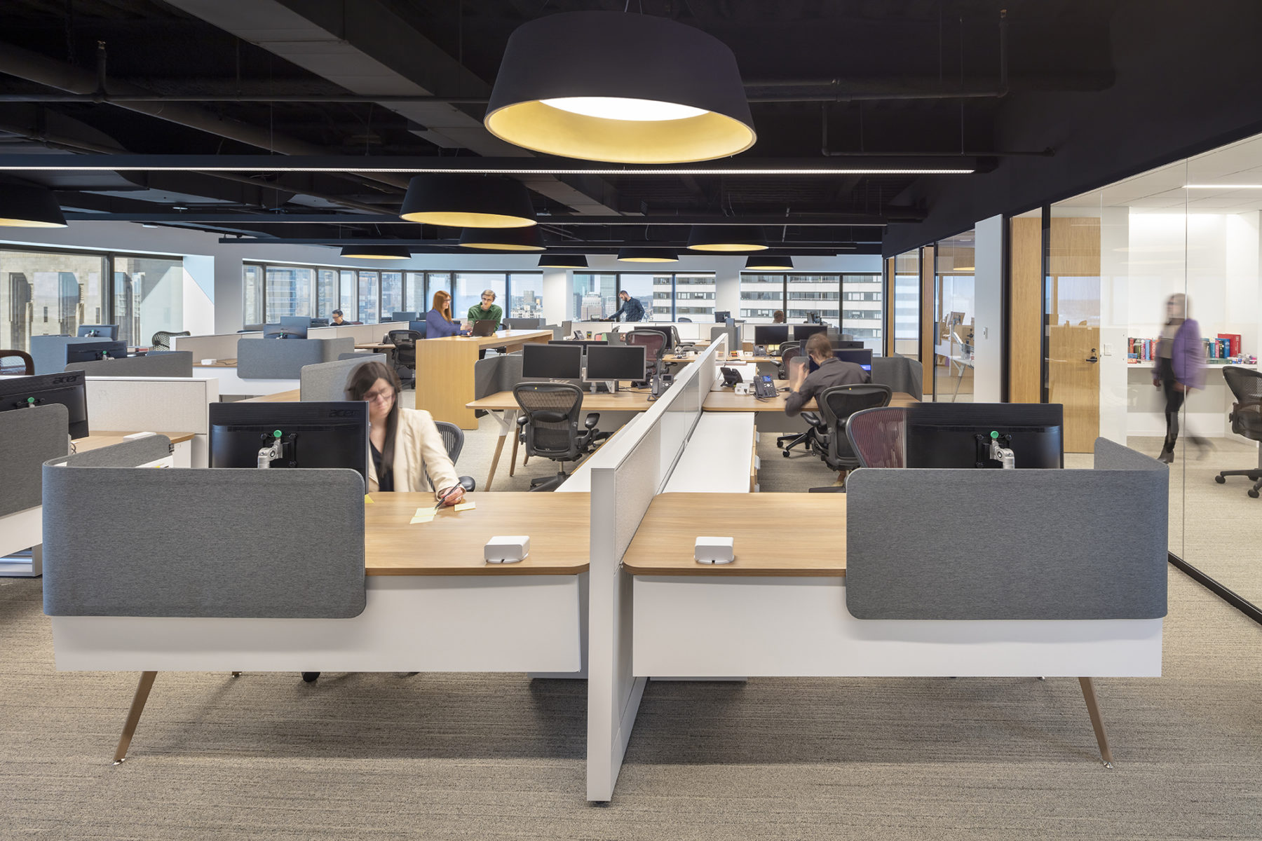 Direct view of workstations with conference room on the right