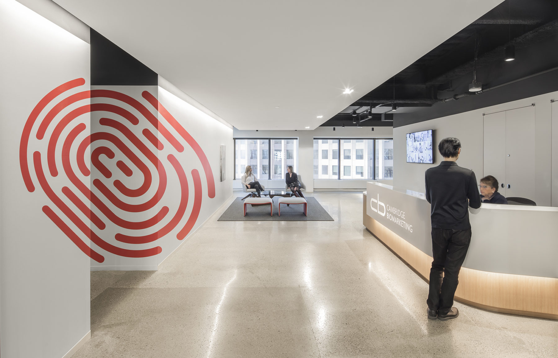 Lobby shot showcasing fingerprint logo on the wall