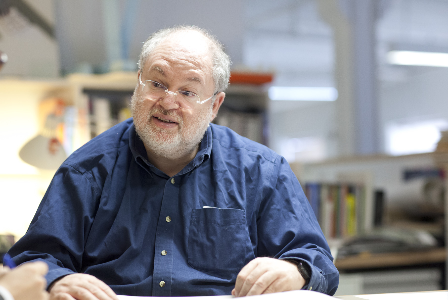 Photo of Dennis at a table